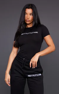 PRETTYLITTLETHING Black Logo Short Sleeved Bodysuit